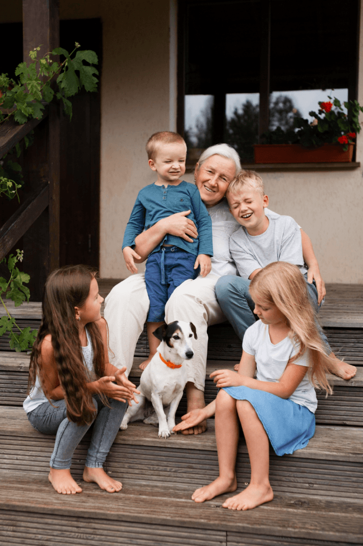 Grandmother with grandchildren outdoors