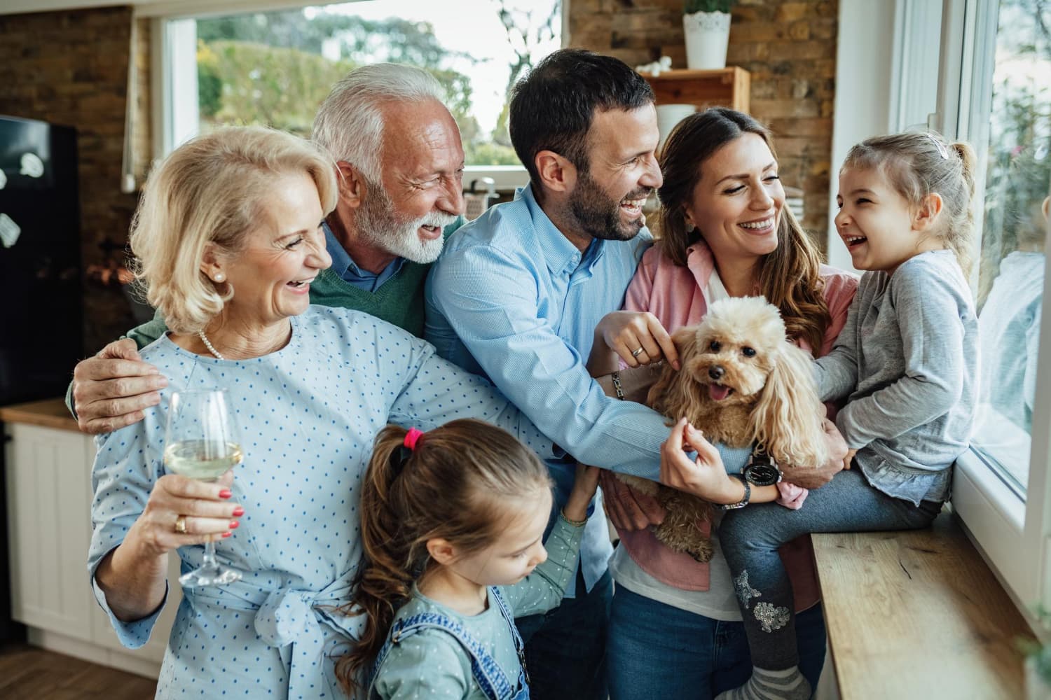 Multi-generational family sharing a warm moment together at home