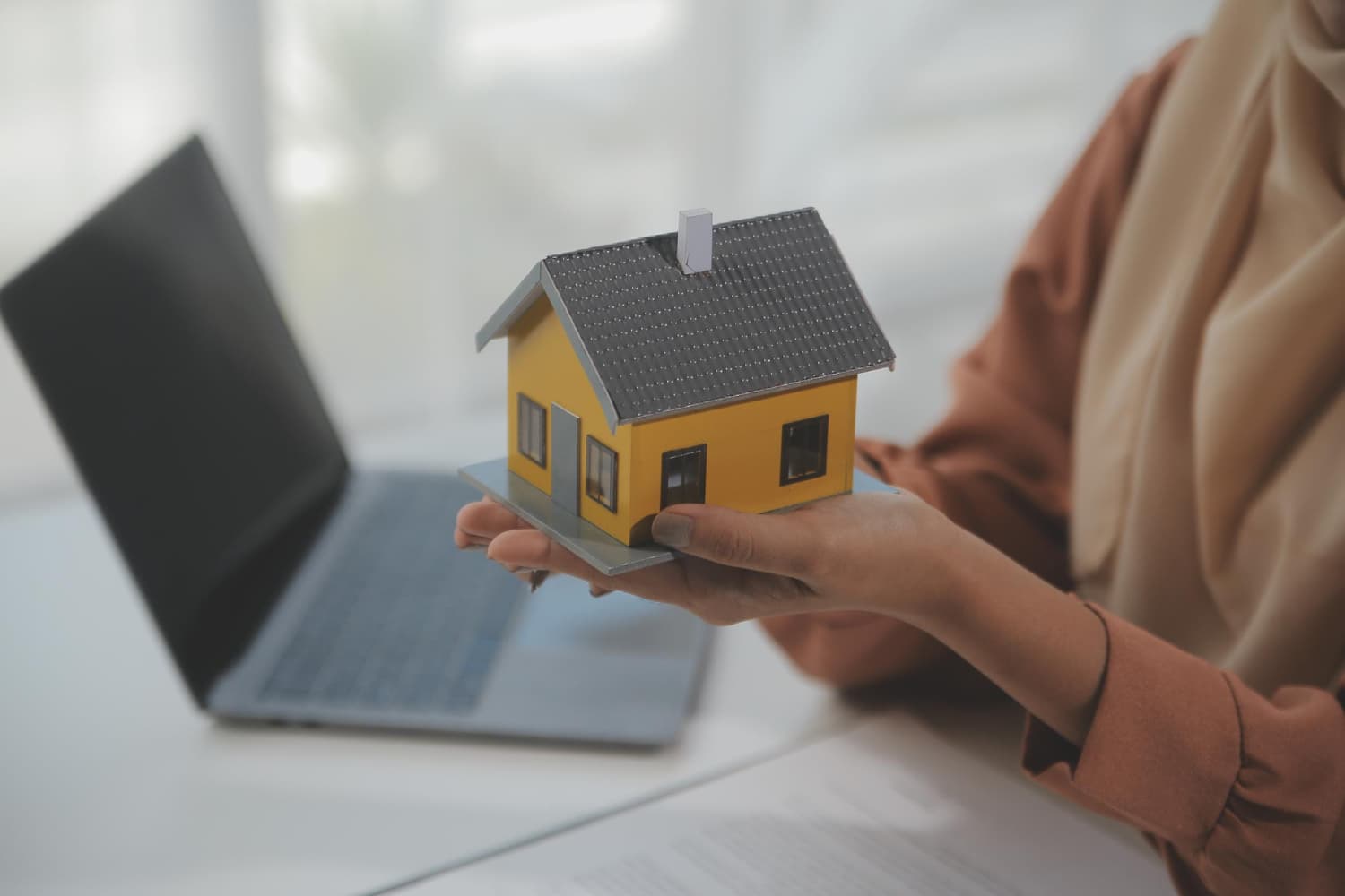 Model house representing home coverage